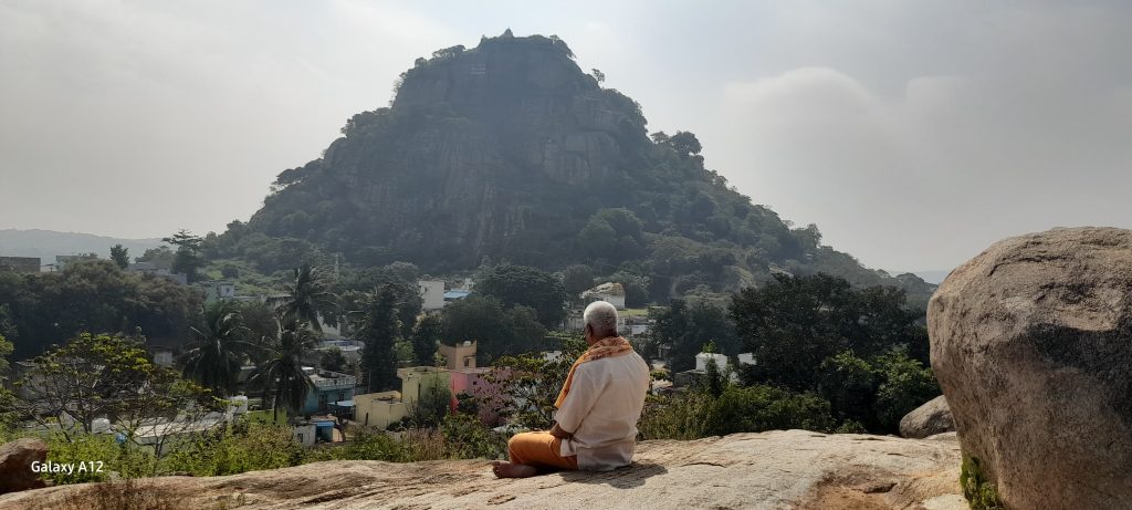 Swami Dattapadanand Ji ofTadEkam in Kangundi Village View Point Meditating while Focusing on the Kangundi Shivling on the 14 Nov 2025